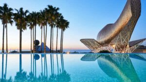 infinity-pool-sunrise-hotel-arts-barcelona-1600x900-1-300x169.jpg