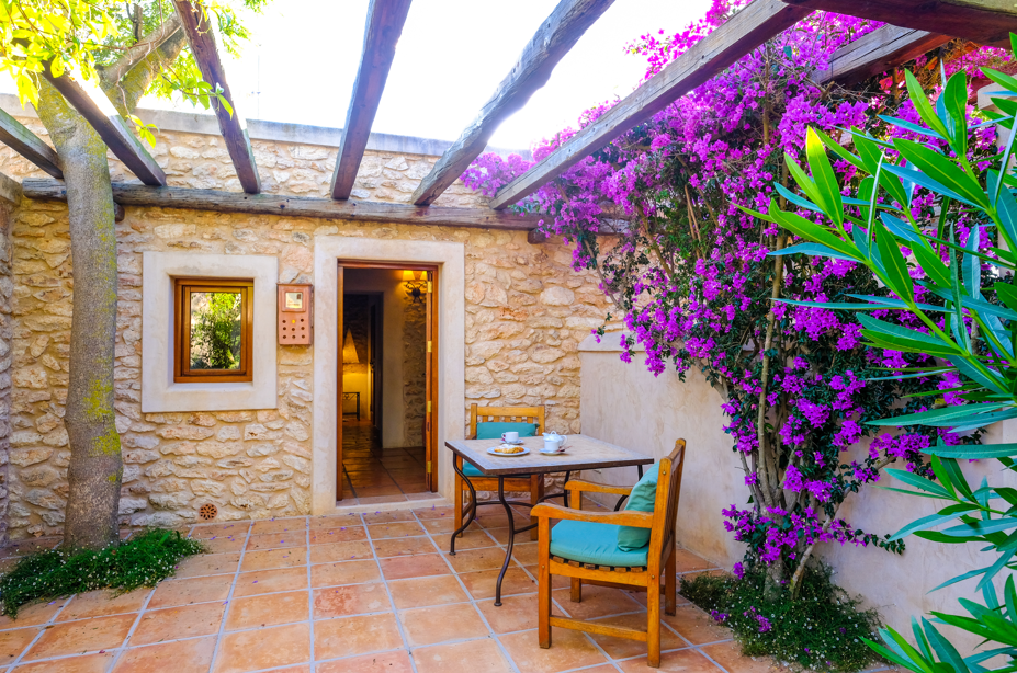 Can Lluc Boutique Country Hotel — Rooms
